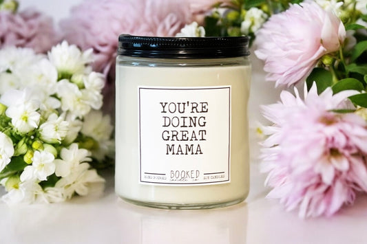 Image of "You're Doing Great Mama" quote surrounding by a pink and white floral arrangement